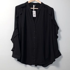 Woman’s semi sheer black blouse.